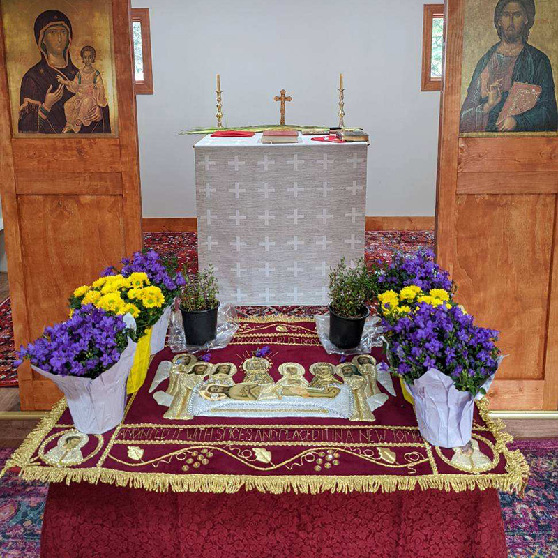 st johns altar with flowers